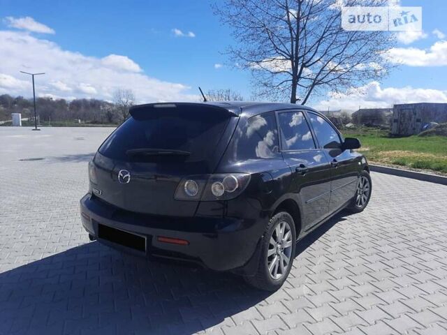Чорний Мазда 3, об'ємом двигуна 2 л та пробігом 222 тис. км за 5700 $, фото 4 на Automoto.ua