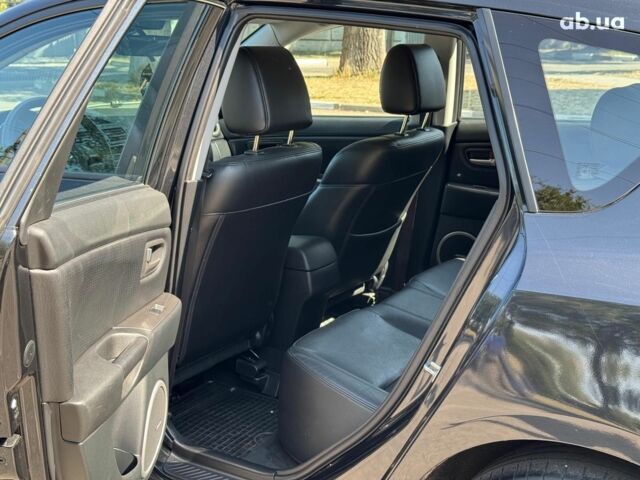 Черный Мазда 3, объемом двигателя 1.6 л и пробегом 131 тыс. км за 5990 $, фото 12 на Automoto.ua