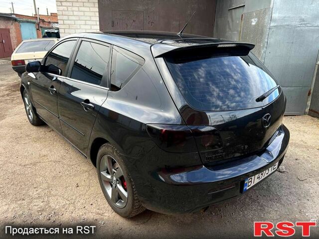 Черный Мазда 3, объемом двигателя 1.6 л и пробегом 333 тыс. км за 4600 $, фото 2 на Automoto.ua