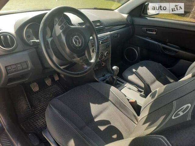 Чорний Мазда 3, об'ємом двигуна 2 л та пробігом 222 тис. км за 5700 $, фото 9 на Automoto.ua