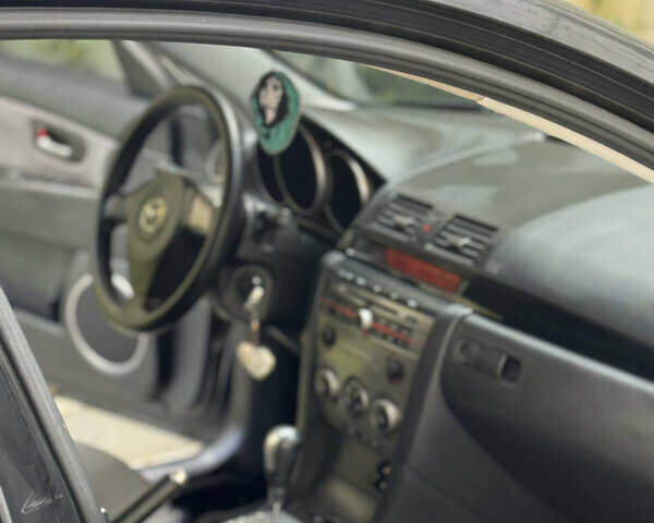 Мазда 3 2007 в Хмельницком на Automoto.ua Черный Мазда 3, объемом двигателя 1.6 л и пробегом 225 тыс. км за 5700 $, фото 36 на Automoto.ua