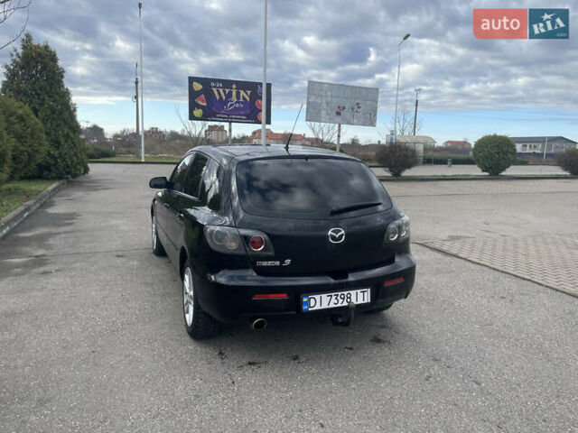 Черный Мазда 3, объемом двигателя 2 л и пробегом 252 тыс. км за 4000 $, фото 2 на Automoto.ua