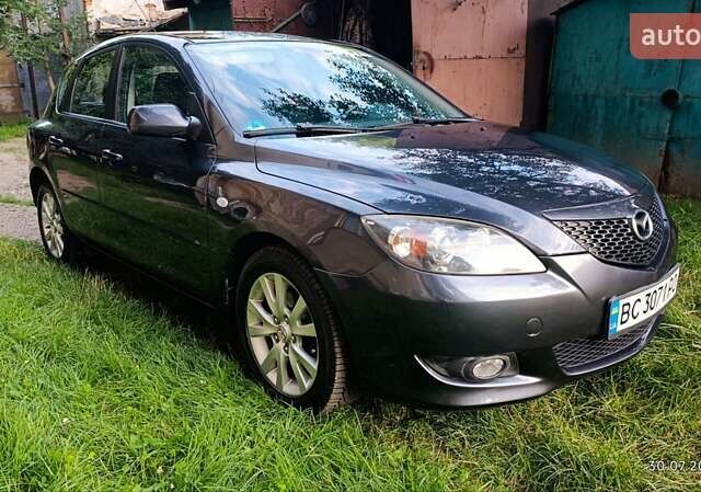 Чорний Мазда 3, об'ємом двигуна 1.6 л та пробігом 205 тис. км за 4999 $, фото 4 на Automoto.ua