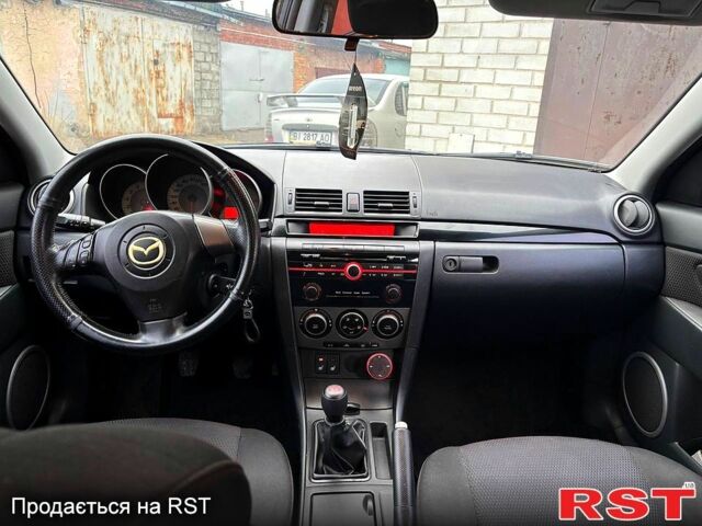 Черный Мазда 3, объемом двигателя 1.6 л и пробегом 333 тыс. км за 4600 $, фото 10 на Automoto.ua