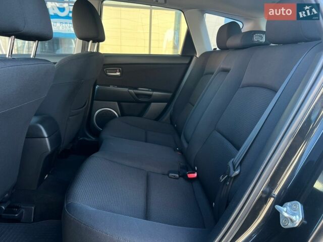 Чорний Мазда 3, об'ємом двигуна 1.6 л та пробігом 146 тис. км за 5999 $, фото 16 на Automoto.ua
