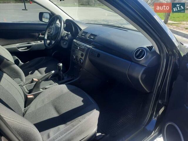 Чорний Мазда 3, об'ємом двигуна 2 л та пробігом 222 тис. км за 5700 $, фото 12 на Automoto.ua