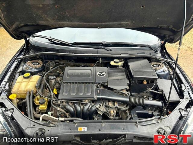 Черный Мазда 3, объемом двигателя 1.6 л и пробегом 333 тыс. км за 4600 $, фото 12 на Automoto.ua
