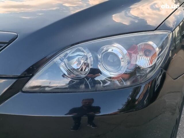 Чорний Мазда 3, об'ємом двигуна 1.6 л та пробігом 187 тис. км за 4990 $, фото 2 на Automoto.ua