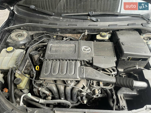 Черный Мазда 3, объемом двигателя 1.6 л и пробегом 136 тыс. км за 5500 $, фото 16 на Automoto.ua