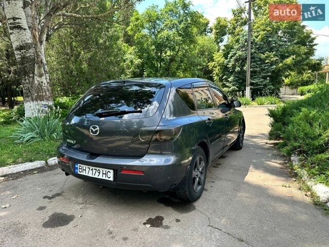 Чорний Мазда 3, об'ємом двигуна 1.6 л та пробігом 197 тис. км за 4500 $, фото 3 на Automoto.ua