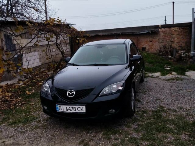 Черный Мазда 3, объемом двигателя 1.6 л и пробегом 246 тыс. км за 5500 $, фото 1 на Automoto.ua