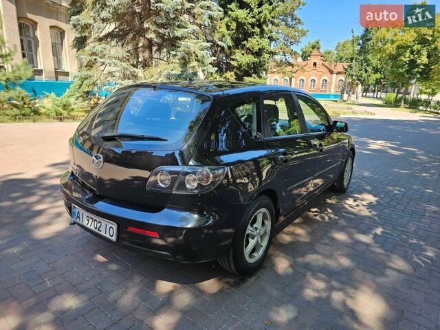 Черный Мазда 3, объемом двигателя 1.6 л и пробегом 241 тыс. км за 4650 $, фото 5 на Automoto.ua