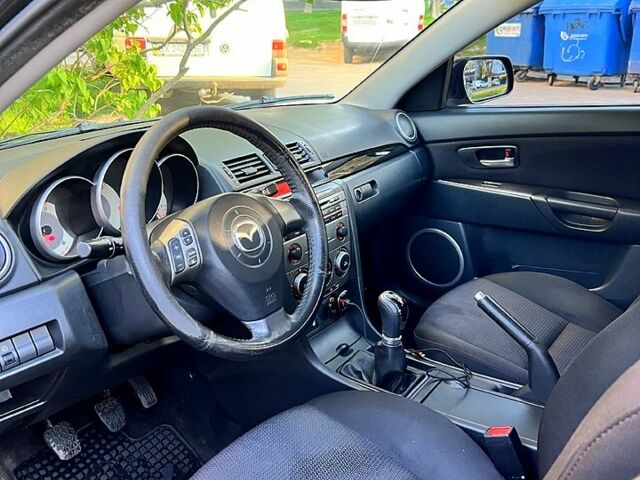 Чорний Мазда 3, об'ємом двигуна 1.6 л та пробігом 284 тис. км за 4800 $, фото 9 на Automoto.ua