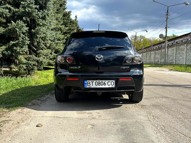 Чорний Мазда 3, об'ємом двигуна 2.3 л та пробігом 179 тис. км за 6700 $, фото 3 на Automoto.ua