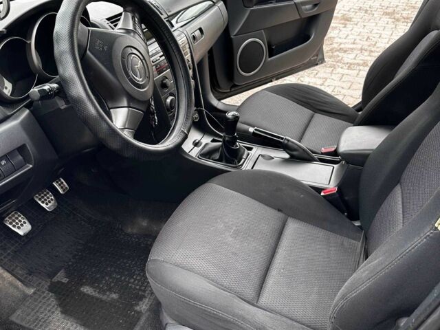 Чорний Мазда 3, об'ємом двигуна 2 л та пробігом 310 тис. км за 4304 $, фото 6 на Automoto.ua