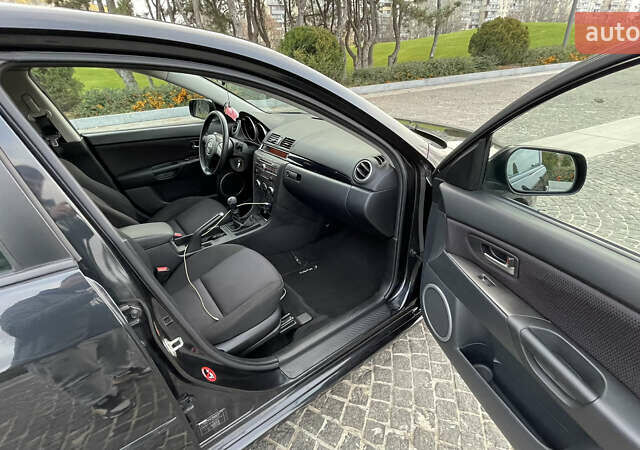 Черный Мазда 3, объемом двигателя 2 л и пробегом 220 тыс. км за 6000 $, фото 27 на Automoto.ua