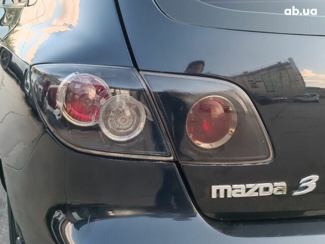 Чорний Мазда 3, об'ємом двигуна 1.6 л та пробігом 187 тис. км за 4990 $, фото 9 на Automoto.ua