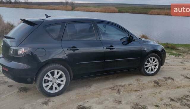 Черный Мазда 3, объемом двигателя 1.6 л и пробегом 193 тыс. км за 5000 $, фото 1 на Automoto.ua