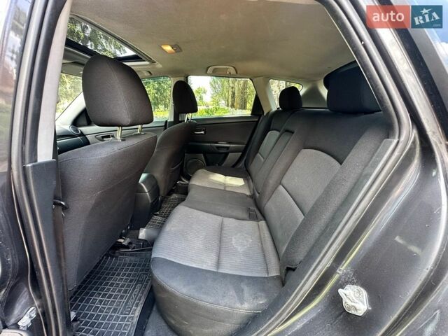 Чорний Мазда 3, об'ємом двигуна 1.6 л та пробігом 197 тис. км за 4500 $, фото 12 на Automoto.ua