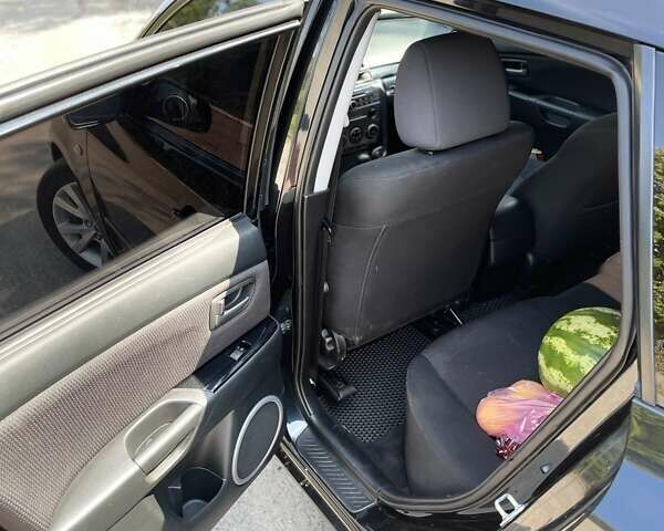 Черный Мазда 3, объемом двигателя 1.6 л и пробегом 228 тыс. км за 4999 $, фото 4 на Automoto.ua