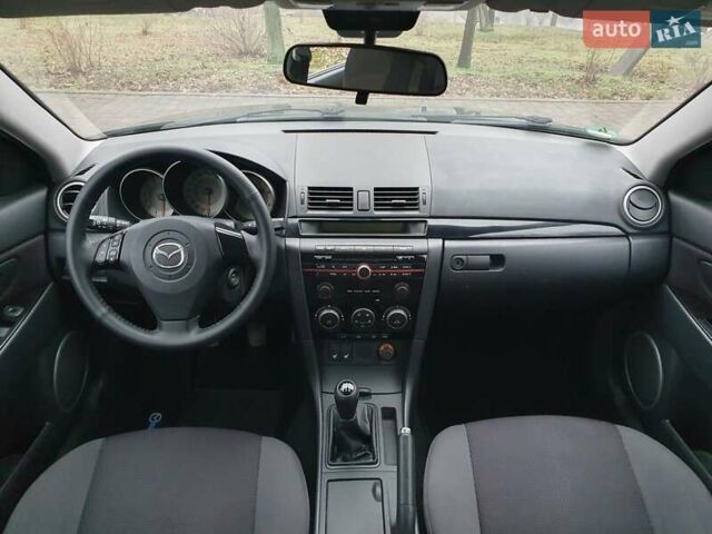 Черный Мазда 3, объемом двигателя 1.6 л и пробегом 264 тыс. км за 5700 $, фото 9 на Automoto.ua