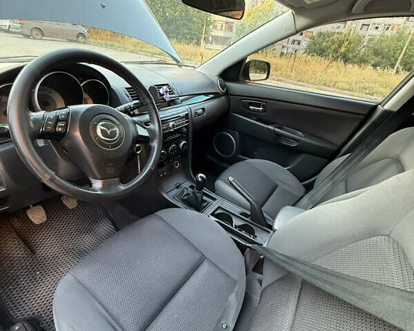 Черный Мазда 3, объемом двигателя 1.6 л и пробегом 211 тыс. км за 5999 $, фото 7 на Automoto.ua