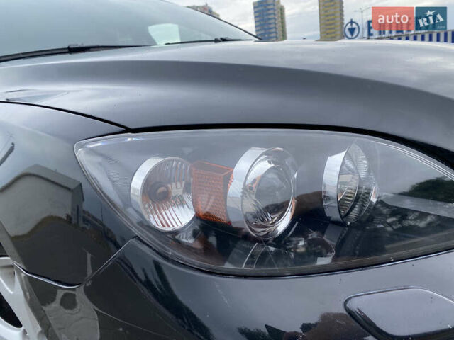 Черный Мазда 3, объемом двигателя 2 л и пробегом 200 тыс. км за 5750 $, фото 28 на Automoto.ua