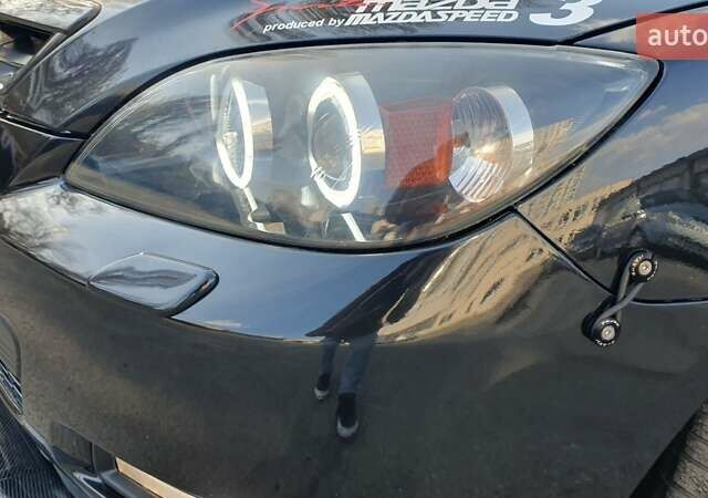 Черный Мазда 3, объемом двигателя 2 л и пробегом 250 тыс. км за 4900 $, фото 23 на Automoto.ua