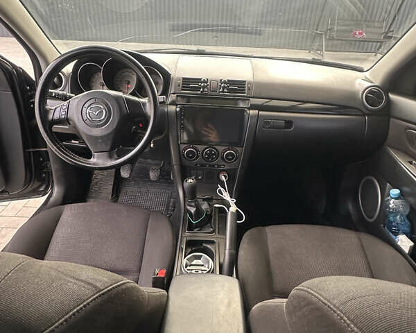 Чорний Мазда 3, об'ємом двигуна 1.6 л та пробігом 215 тис. км за 5500 $, фото 12 на Automoto.ua