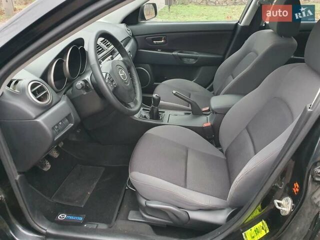 Черный Мазда 3, объемом двигателя 1.6 л и пробегом 264 тыс. км за 5700 $, фото 12 на Automoto.ua