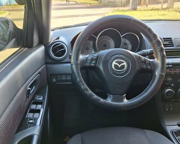 Черный Мазда 3, объемом двигателя 2 л и пробегом 198 тыс. км за 6200 $, фото 8 на Automoto.ua