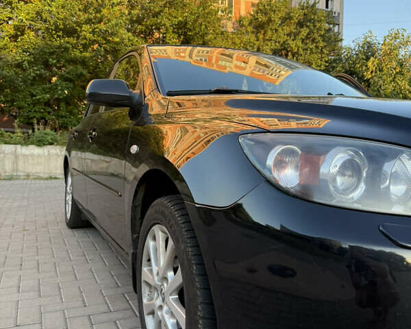 Черный Мазда 3, объемом двигателя 1.6 л и пробегом 211 тыс. км за 5999 $, фото 3 на Automoto.ua