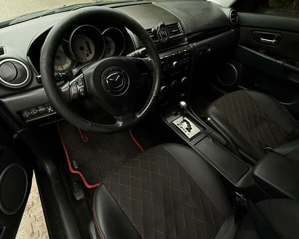 Черный Мазда 3, объемом двигателя 2 л и пробегом 274 тыс. км за 6800 $, фото 19 на Automoto.ua