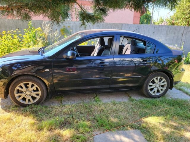 Черный Мазда 3, объемом двигателя 1.6 л и пробегом 325 тыс. км за 4600 $, фото 1 на Automoto.ua