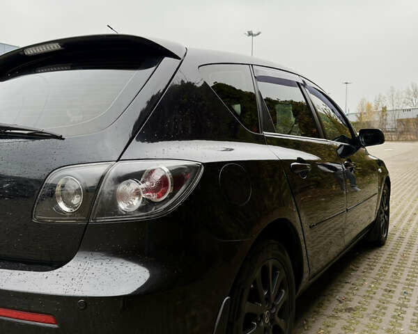 Черный Мазда 3, объемом двигателя 2 л и пробегом 274 тыс. км за 6800 $, фото 7 на Automoto.ua