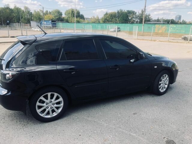 Чорний Мазда 3, об'ємом двигуна 1.6 л та пробігом 191 тис. км за 6500 $, фото 5 на Automoto.ua