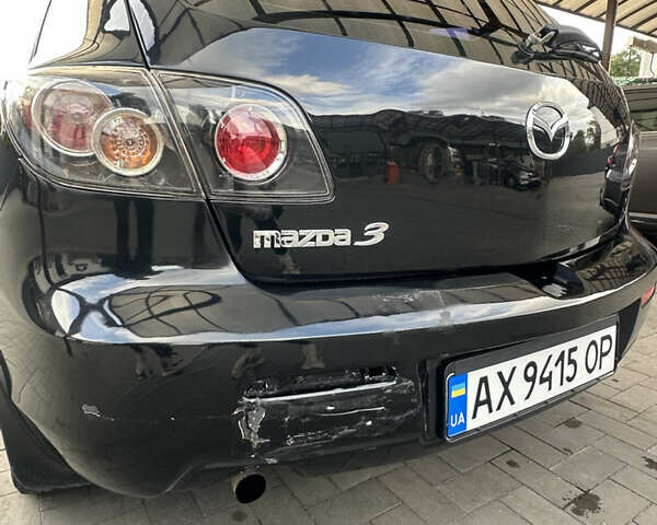 Чорний Мазда 3, об'ємом двигуна 1.6 л та пробігом 215 тис. км за 5500 $, фото 20 на Automoto.ua