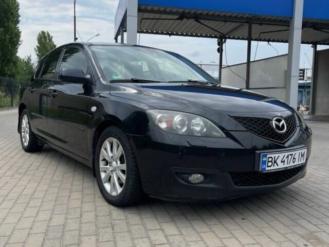 Черный Мазда 3, объемом двигателя 1.6 л и пробегом 180 тыс. км за 6198 $, фото 1 на Automoto.ua