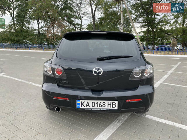 Черный Мазда 3, объемом двигателя 2 л и пробегом 200 тыс. км за 5750 $, фото 7 на Automoto.ua