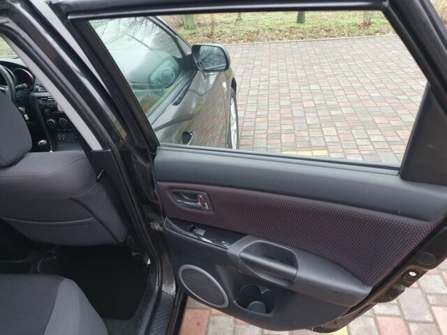 Чорний Мазда 3, об'ємом двигуна 1.6 л та пробігом 264 тис. км за 5700 $, фото 16 на Automoto.ua