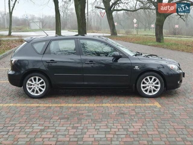 Черный Мазда 3, объемом двигателя 1.6 л и пробегом 264 тыс. км за 5700 $, фото 3 на Automoto.ua