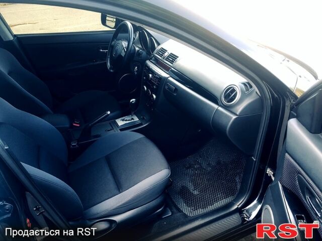 Чорний Мазда 3, об'ємом двигуна 1.6 л та пробігом 191 тис. км за 6500 $, фото 6 на Automoto.ua