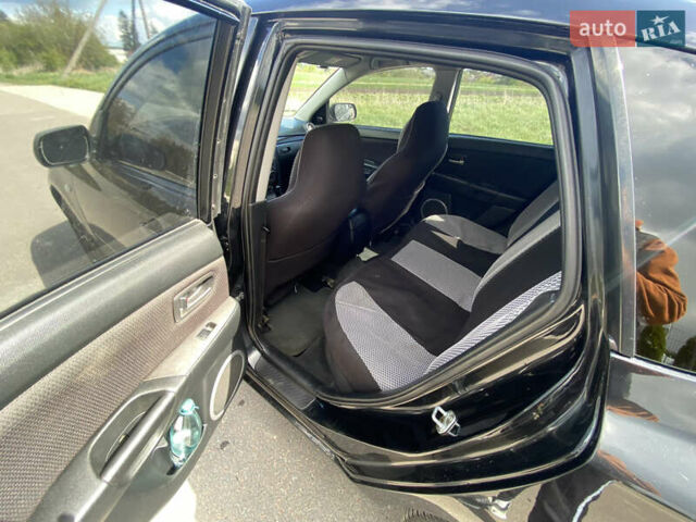 Черный Мазда 3, объемом двигателя 1.6 л и пробегом 260 тыс. км за 5300 $, фото 9 на Automoto.ua