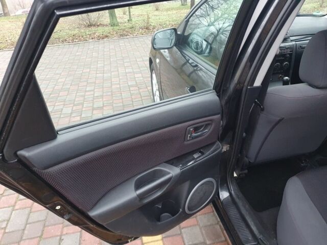 Чорний Мазда 3, об'ємом двигуна 1.6 л та пробігом 264 тис. км за 5700 $, фото 14 на Automoto.ua