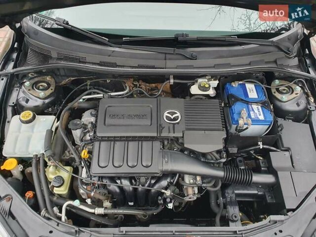 Черный Мазда 3, объемом двигателя 1.6 л и пробегом 264 тыс. км за 5700 $, фото 21 на Automoto.ua