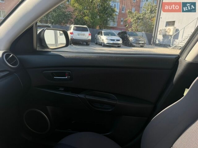 Чорний Мазда 3, об'ємом двигуна 1.56 л та пробігом 213 тис. км за 5600 $, фото 39 на Automoto.ua