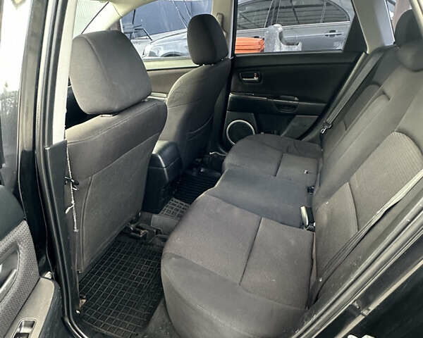 Чорний Мазда 3, об'ємом двигуна 1.6 л та пробігом 215 тис. км за 5500 $, фото 17 на Automoto.ua