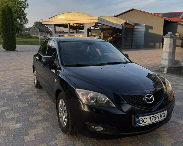 Черный Мазда 3, объемом двигателя 1.6 л и пробегом 240 тыс. км за 6200 $, фото 2 на Automoto.ua