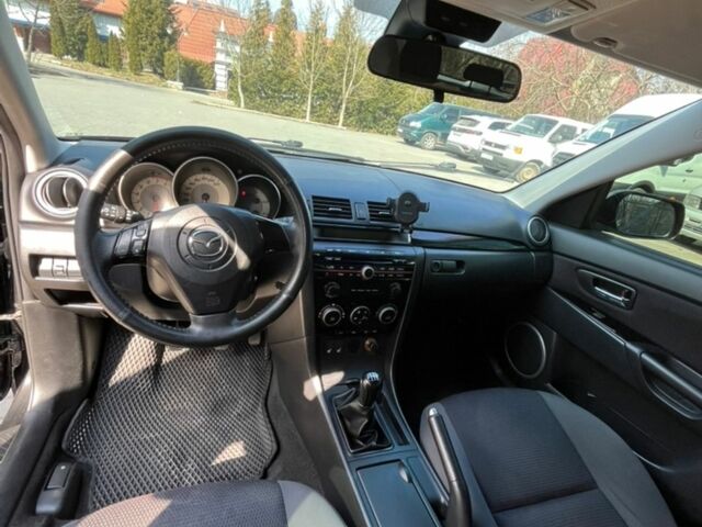 Чорний Мазда 3, об'ємом двигуна 1.6 л та пробігом 158 тис. км за 5999 $, фото 16 на Automoto.ua