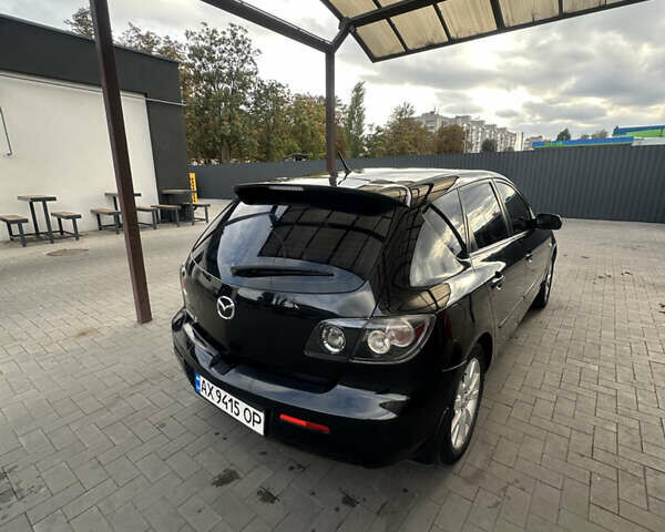 Чорний Мазда 3, об'ємом двигуна 1.6 л та пробігом 215 тис. км за 5500 $, фото 3 на Automoto.ua